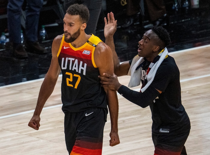 (Rick Egan | The Salt Lake Tribune) Utah Jazz guard Miye Oni, right, congratulates Utah Jazz center Rudy Gobert (27) after he blocked a shot by LA Clippers forward Marcus Morris Sr. (8) with seconds left in Game One of the second round of the NBA playoffs at Vivint Arena, on Tuesday, June 8, 2021.