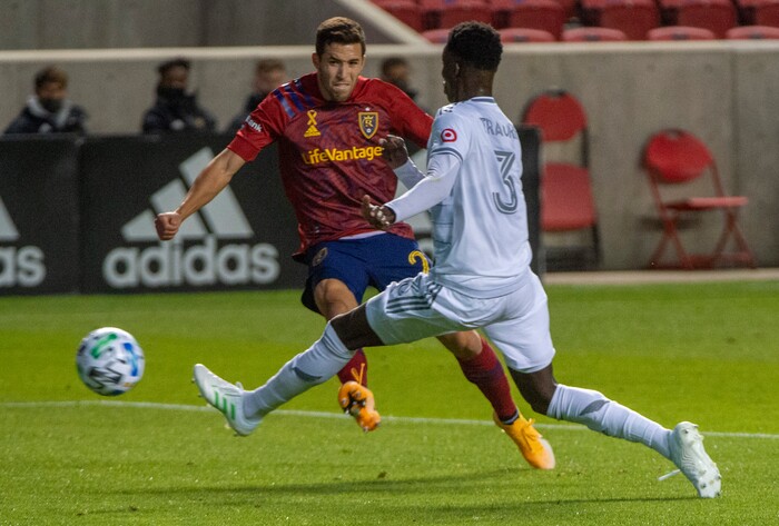 (Rick Egan  |  The Salt Lake Tribune).  Real Salt Lake defender Aaron Herrera (22) kicks the ball as Los Angeles FC Mohamed Traore defends, in MLS soccer action between Real Salt Lake and Los Angeles FC at Rio Tinto Stadium, on Wednesday, Sept. 9, 2020.