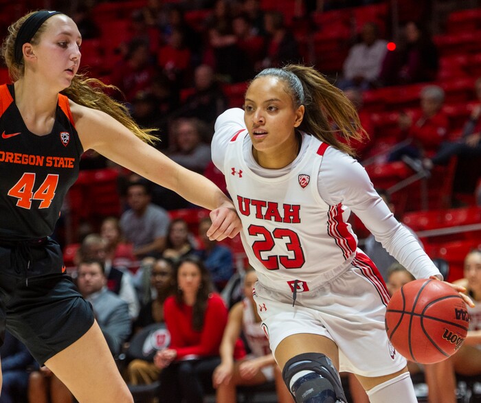 (Rick Egan  |  The Salt Lake Tribune)     Utah Utes guard Daneesha Provo (23) gets past Oregon State Beavers forward Taylor Jones (44), in PAC-12 basketball action between the Utah Utes and the Oregon State Beavers at the Jon M. Huntsman Center, Saturday, Feb. 1, 2020.