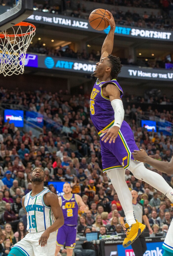 (Rick Egan  |  The Salt Lake Tribune)   Utah Jazz guard Donovan Mitchell (45) dunks the ball, in NBA action between the Utah Jazz and the Charlotte Hornets, in Salt Lake City,  Monday, April 1, 2019.