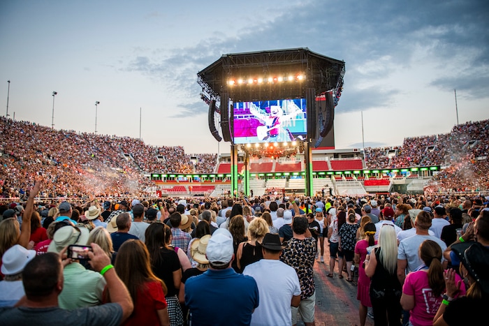 (Isaac Hale | Special to The Tribune) Fans watch as Garth Brooks performs with his band during a stop on their stadium tour held at Rice-Eccles Stadium in Salt Lake City on Saturday, July 17, 2021.