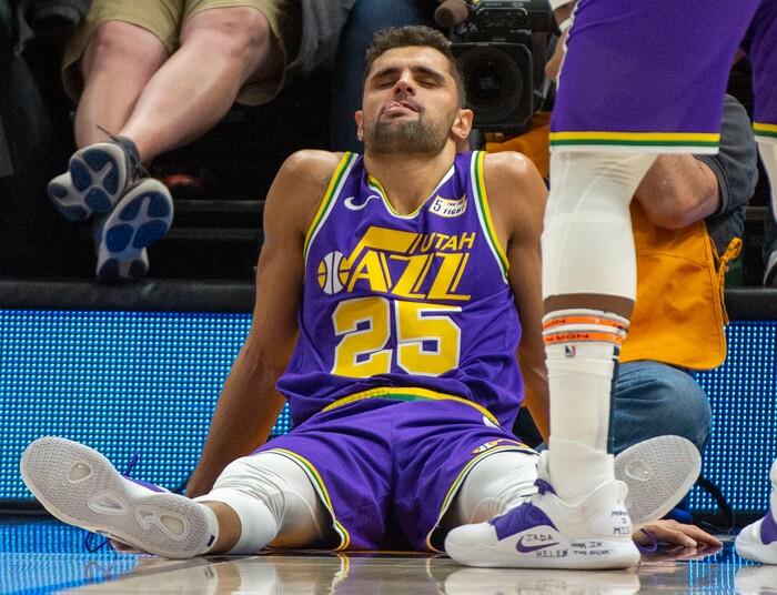 (Rick Egan  |  The Salt Lake Tribune)        Utah Jazz guard Raul Neto (25) sit on the floor after being knocked to the ground, in NBA action the Utah Jazz and the Washington Wizards, in Salt Lake City, Friday, March 29, 2019.