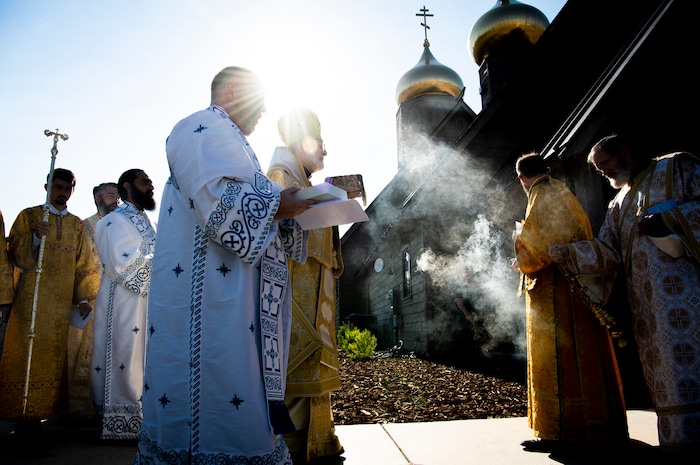 (Isaac Hale | Special to The Tribune) Metropolitan Joseph, leader of the Antiochian Orthodox Christian Archdiocese of North America, along with clergy and members of the congregation process around the church during a consecration service for St. Xenia Orthodox Church in Payson on Saturday, July 16, 2022.