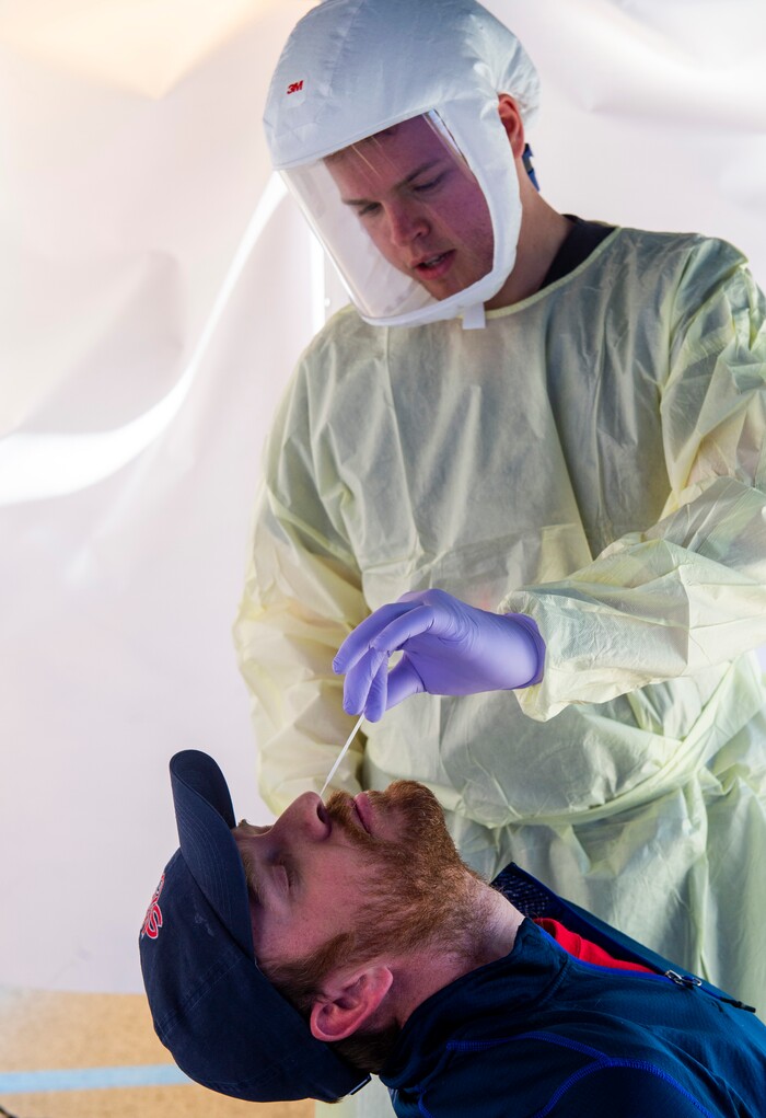 (Rick Egan  |  The Salt Lake Tribune)   David Neeley gets tested by Intermountain Healthcare medical assistant, Connor Meads, at the Intermountain Healthcare Coronavirus Mobile Testing Unit at Utah Valley Hospital in Provo, Friday May 8, 2020.