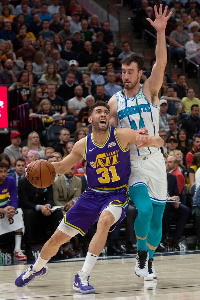 (Rick Egan  |  The Salt Lake Tribune)   Utah Jazz forward Georges Niang (31) takes the ball to the basket, as Charlotte Hornets forward Frank Kaminsky (44) defends, in NBA action between the Utah Jazz and the Charlotte Hornets, in Salt Lake City,  Monday, April 1, 2019.