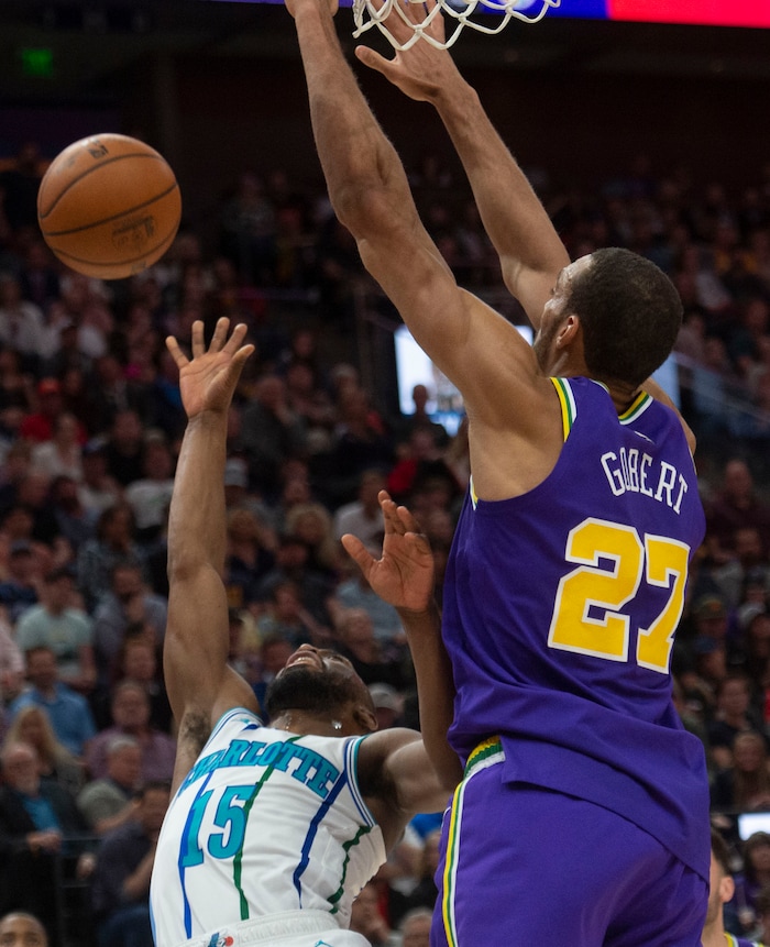 (Rick Egan  |  The Salt Lake Tribune)   Charlotte Hornets guard Kemba Walker (15) runs into Utah Jazz center Rudy Gobert (27), in NBA action between the Utah Jazz and the Charlotte Hornets, in Salt Lake City,  Monday, April 1, 2019.