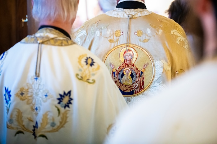 (Isaac Hale | Special to The Tribune) Priests, deacons and subdeacons make their way out into the congregation during a consecration service for St. Xenia Orthodox Church in Payson on Saturday, July 16, 2022.
