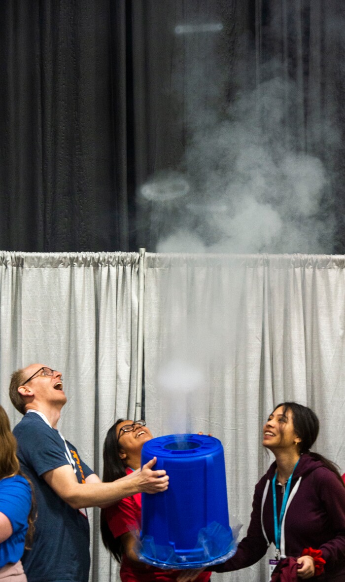 (Rick Egan  |  The Salt Lake Tribune)         Participants make smoke rings at one of the exhibits during the SheTech Explorer Day event, at the Mountain America Expo Center in Sandy, Tuesday, April 9, 2019.