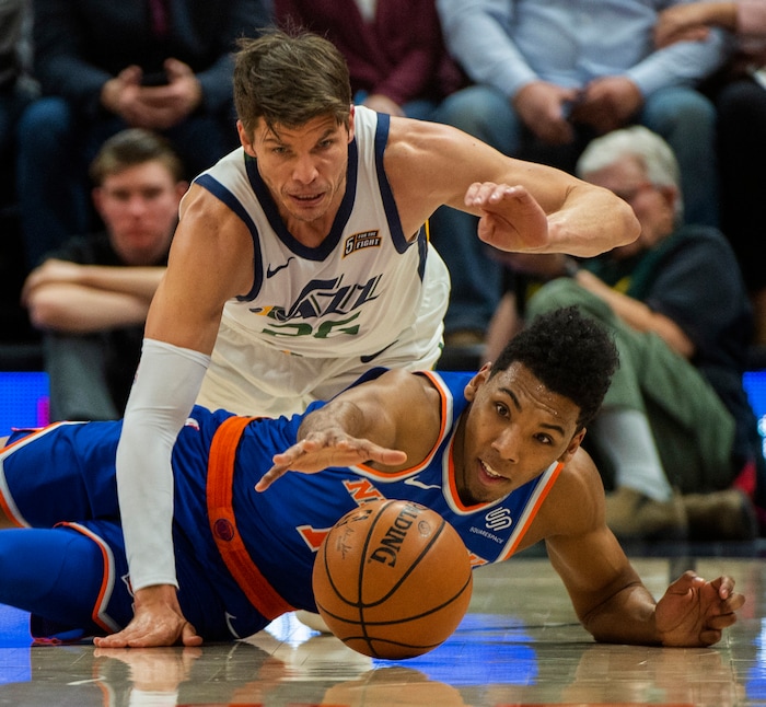 (Rick Egan  |  The Salt Lake Tribune)   Utah Jazz guard Kyle Korver (26) goes after loose ball along with New York Knicks guard Allonzo Trier (14) in NBA action between Utah Jazz and New York Knicks, in Salt Lake City, Saturday, Dec. 29, 2018.