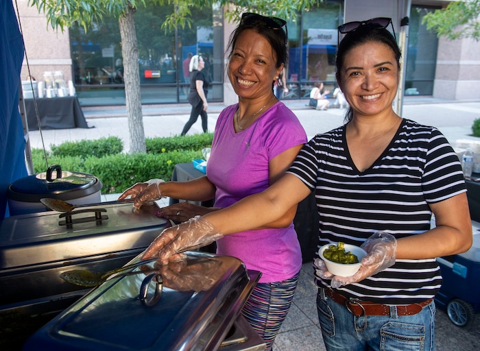 (Rick Egan  |  The Salt Lake Tribune)     Bina and Sita prepare food from Nepal for the Sikkim Momo booth at the Gallivan Center, as Salt Lake City's Spice Kitchen Incubator program serves a variety of international cuisine at the welcome party for the United Nations Civil Society Conference, Sunday, Aug. 25, 2019.