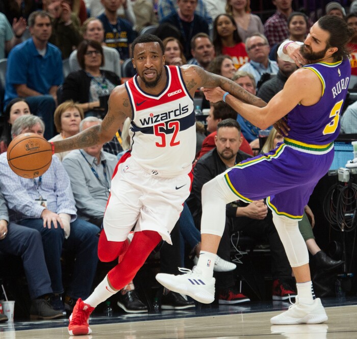 (Rick Egan  |  The Salt Lake Tribune)        Utah Jazz guard Ricky Rubio (3) is called for a personal foul as he tries to stop Washington Wizards guard Jordan McRae (52), in NBA action between the Utah Jazz and the Washington Wizards, in Salt Lake City, Friday, March 29, 2019.