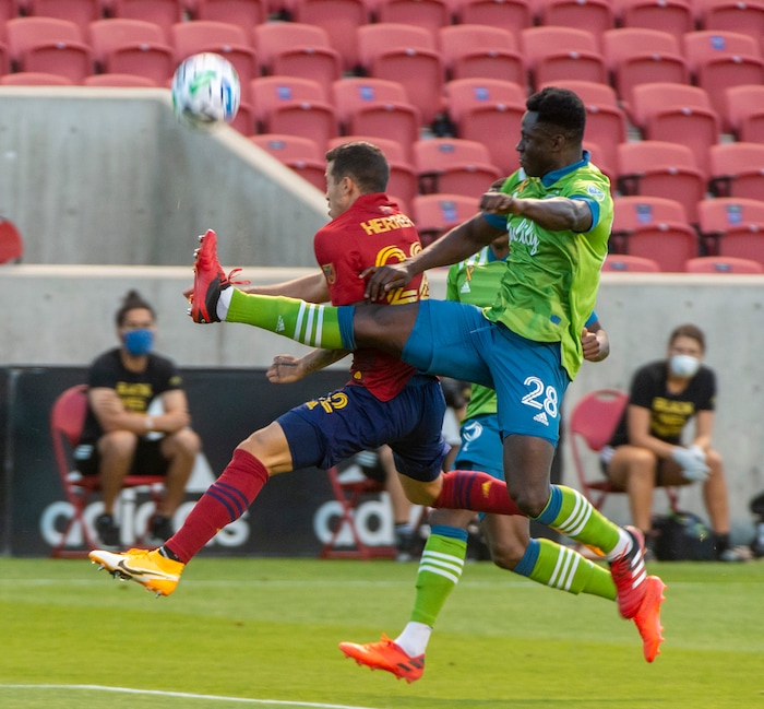 (Rick Egan  |  The Salt Lake Tribune)    Real Salt Lake defender Aaron Herrera (22) and Seattle Sounders defender, Yeimar Gmez Andrade go for the ball, in MLS soccer action between Real Salt Lake and the Seattle Sounders, at Rio Tinto Stadium, Wednesday, Sept. 2, 2020.