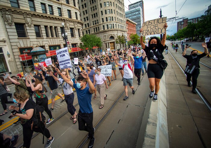 (Rick Egan  |  The Salt Lake Tribune)     Protesters march down Main Street in Salt Lake City, during a Justice for Bernardo rally on Thursday, June 25, 2020.