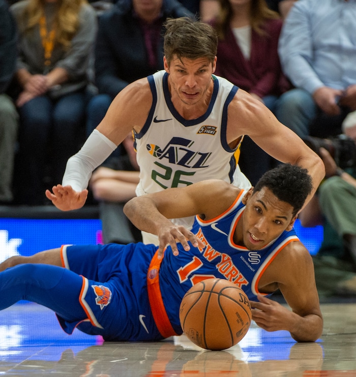 (Rick Egan  |  The Salt Lake Tribune)   Utah Jazz guard Kyle Korver (26) goes after loose ball along with New York Knicks guard Allonzo Trier (14) in NBA action between Utah Jazz and New York Knicks, in Salt Lake City, Saturday, Dec. 29, 2018.