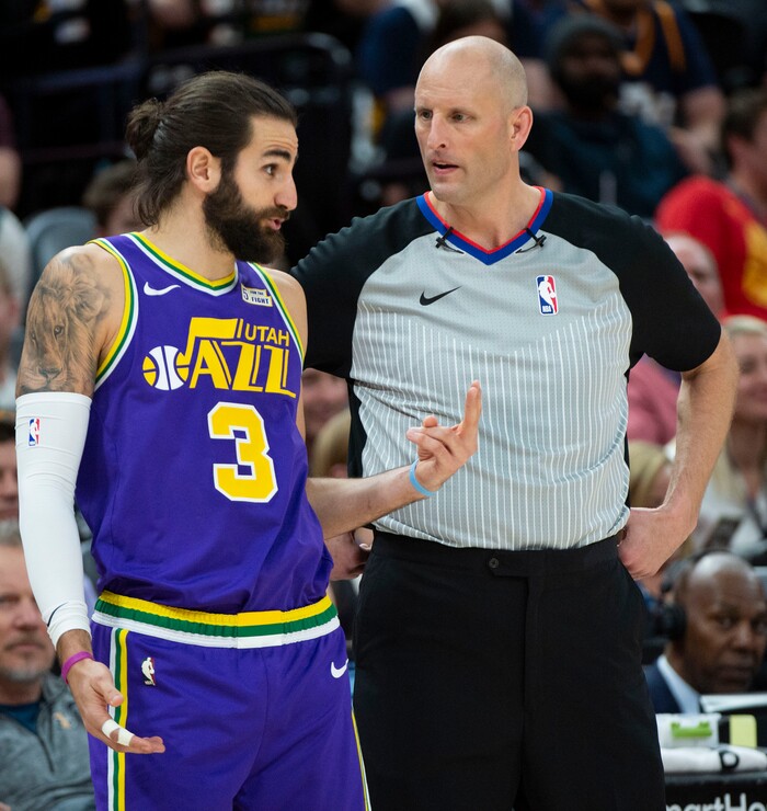 (Rick Egan  |  The Salt Lake Tribune)    Utah Jazz guard Ricky Rubio (3) has a chat with referee Eric Dalen (37), in NBA action between the Utah Jazz and the Charlotte Hornets, in Salt Lake City,  Monday, April 1, 2019.