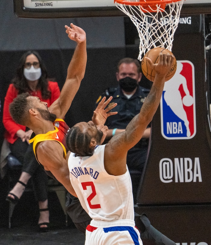 (Rick Egan | The Salt Lake Tribune) LA Clippers forward Kawhi Leonard (2) shoots as Utah Jazz center Rudy Gobert (27) defends, in NBA action between the Utah Jazz and the LA Clippers, in game one in the second round of the NBA playoff series at Vivint Arena, on Tuesday, June 8, 2021.