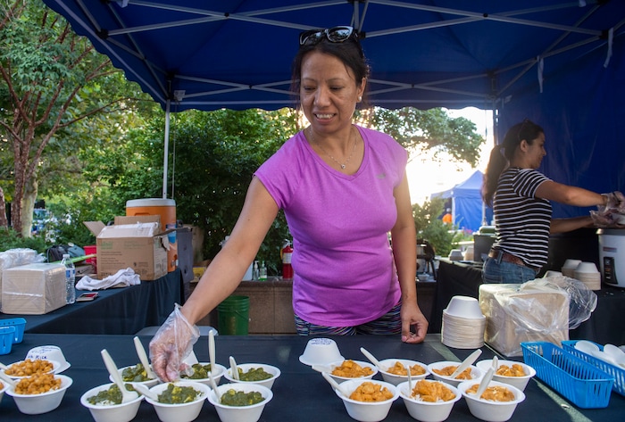 (Rick Egan  |  The Salt Lake Tribune)     Bina and Sita prepare food from Nepal for the Sikkim Momo booth at the Gallivan Center, as Salt Lake City's Spice Kitchen Incubator program serves a variety of international cuisine at the welcome party for the United Nations Civil Society Conference, Sunday, Aug. 25, 2019.