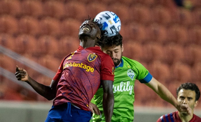 (Rick Egan  |  The Salt Lake Tribune)   Real Salt Lake forward Sam Johnson (50) and Seattle Sounders midfielder Joao Paulo (6) go for the ball, in MLS soccer action between Real Salt Lake and the Seattle Sounders, at Rio Tinto Stadium, Wednesday, Sept. 2, 2020.