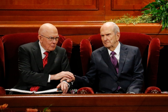 (Rick Bowmer  |  AP) President Russell M. Nelson, right, talks with his counselor, Dallin H. Oaks, left, during The Church of Jesus Christ of Latter-day Saints' twice-annual church conference Saturday, Oct. 5, 2019, in Salt Lake City. Nelson has rolled out a number of policy changes during his first two years at the helm of the faith, leading to heightened anticipation for what he may announce at this weekend's conference in Salt Lake City.