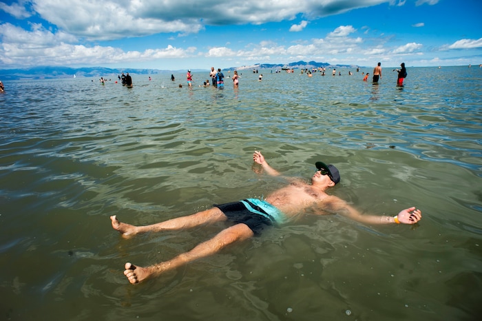 (Rick Egan  |  The Salt Lake Tribune)    Mikal Kelaitis, floats in the Great Salt Lake  during an attempt to beak the record for most people floating at one time, Saturday morning, June 8, 2019.  The attempt to break the record was turned-on to a polar plunge, because of the cool temperatures.