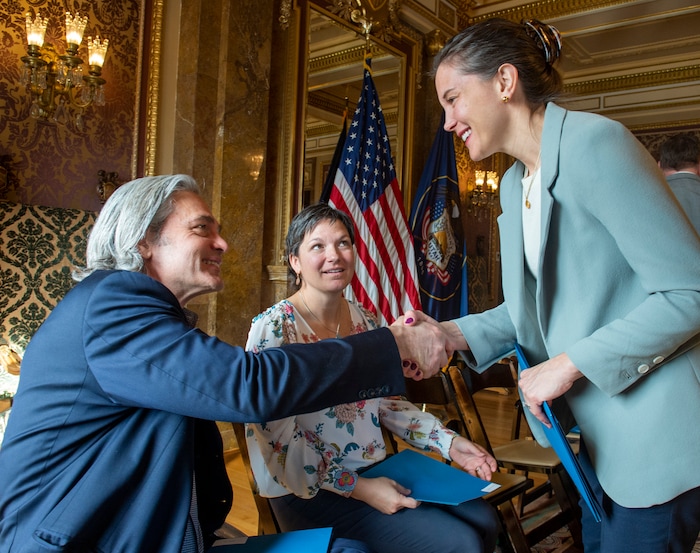 (Rick Egan | The Salt Lake Tribune) Paralympian Chris Waddell, left, shakes hands with Salt Lake City Mayor Erin Mendenhall during a news conference announcing Utah's next steps towards an Olympic and Paralympic Winter Games at the Utah State Capitol, Wednesday, Feb. 12, 2020.