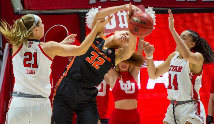 (Rick Egan  |  The Salt Lake Tribune)     Utah Utes forward Maurane Corbin (21) and Utah Utes guard Niyah Becker (14) put pressure on Oregon State Beavers forward Patricia Morris (32), in PAC-12 basketball action between the Utah Utes and the Oregon State Beavers at the Jon M. Huntsman Center, Saturday, Feb. 1, 2020.
