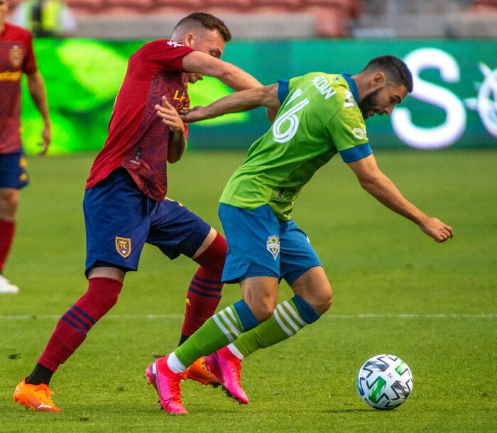 (Rick Egan  |  The Salt Lake Tribune)     Real Salt Lake forward Corey Baird (10) and Seattle Sounders midfielder Alex Roldan (16) go for the ball, in MLS soccer action between Real Salt Lake and the Seattle Sounders, at Rio Tinto Stadium, Wednesday, Sept. 2, 2020.