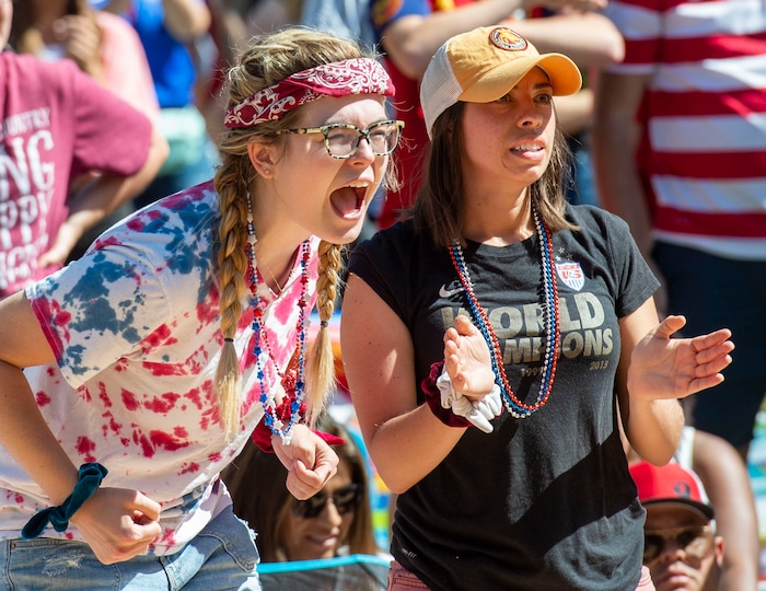 (Rick Egan  |  The Salt Lake Tribune)   Hailey Richards, and Dianelle Gehring cheer as the US women's team scores a goal against the Netherlands in the World Cup final, during a watch party at the Gallivan Center in Salt Lake, Sunday, July 7, 2019.