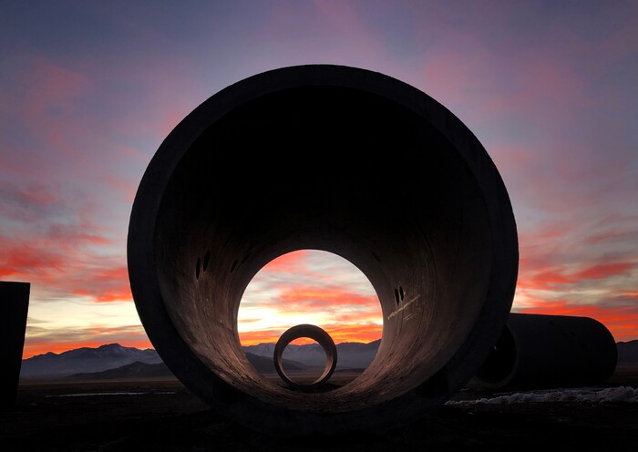 (Rick Egan | The Salt Lake Tribune)  The sky glows through the famed Sun Tunnels sculpture, after sunset, during a unique winter solstice in remote Utah's Great Basin Desert, on Monday, Dec. 21, 2020.