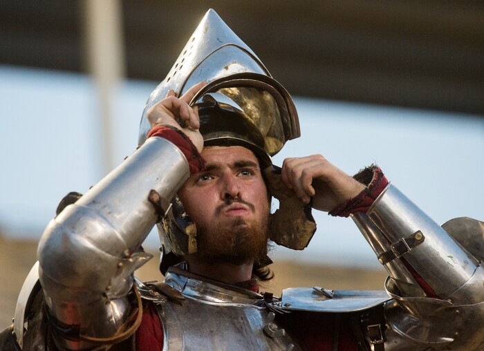 (Rick Egan  |  The Salt Lake Tribune)     Cody Bailey adjusts his helmet as he prepares for the Knights of Mayhem competition, at the Utah State Fair, Thursday, Sept. 6, 2018.