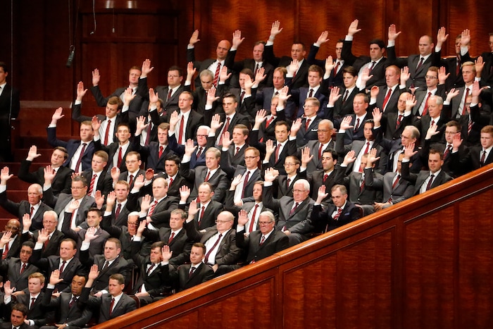 (Rick Bowmer  |  AP) A combined choir from stakes in Provo, Utah, raise their hands during a sustaining vote during The Church of Jesus Christ of Latter-day Saints' twice-annual church conference Saturday, Oct. 5, 2019, in Salt Lake City. President Russell M. Nelson has rolled out a number of policy changes during his first two years at the helm of the faith, leading to heightened anticipation for what he may announce at this weekend's conference in Salt Lake City.