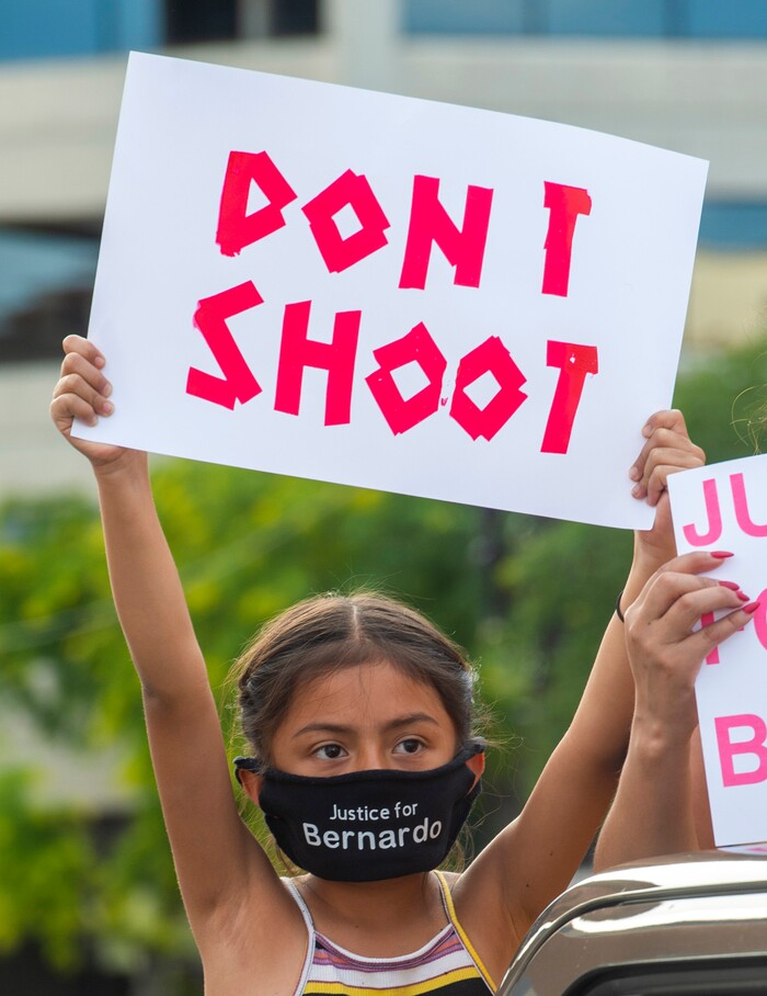 (Rick Egan  |  The Salt Lake Tribune)     Adrianna Palacios, 9, holds a sign during march for racial equality, on Saturday, June 20, 2020.  The Don't Shoot sign was the first one produced on the day of the demonstrations onMay 30, 2020.