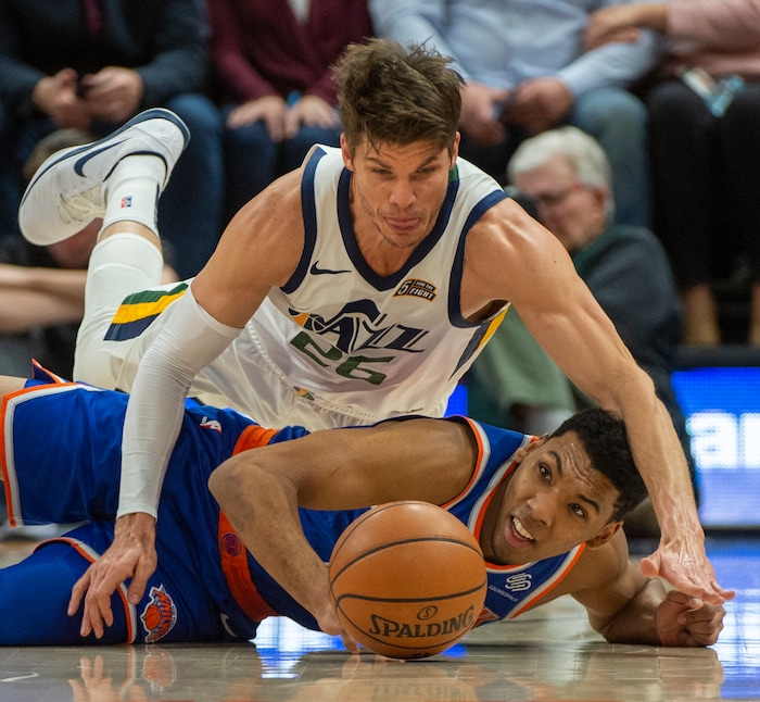(Rick Egan  |  The Salt Lake Tribune)   Utah Jazz guard Kyle Korver (26) goes after loose ball along with New York Knicks guard Allonzo Trier (14) in NBA action between Utah Jazz and New York Knicks, in Salt Lake City, Saturday, Dec. 29, 2018.