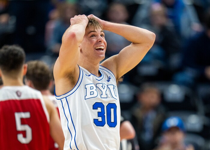 (Rick Egan | The Salt Lake Tribune)  Brigham Young Cougars guard Dallin Hall (30) reacts after a controversial call by the official, in basketball action between the Brigham Young Cougars and the South Dakota Coyotes, at Vivint Arena, in Salt Lake City, on Saturday, Dec. 3, 2022.