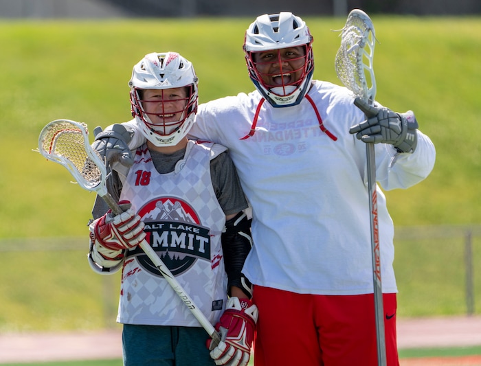 (Rick Egan | The Salt Lake Tribune)  Reilly Pearson-Ortolani  and Tui Tonga, at East youth lacrosse practice, on Wednesday, June 22, 2022.
