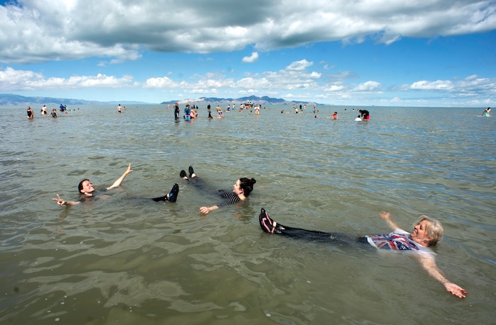 (Rick Egan  |  The Salt Lake Tribune)       Participants float in the Great Salt Lake Saturday, June 8, 2019.  The cool temperatures resulted in a crowd of around 300 people, so the attempt to break the world record was turned into a polar plunge.