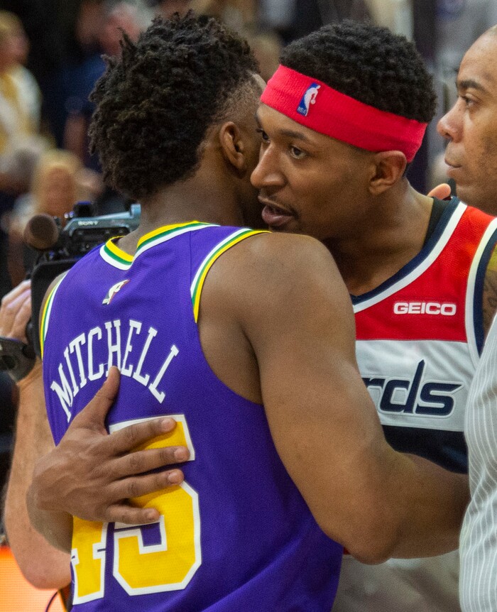 (Rick Egan  |  The Salt Lake Tribune)        Washington Wizards guard Bradley Beal (3) his scorer of the night with 34 points hugs Utah Jazz guard Donovan Mitchell (45) the jazz high scorer of the game with 35 points, after the Utah Jazz defeated the Washington Wizards 128-124, in Salt Lake City, Friday, March 29, 2019.