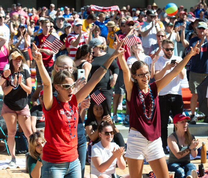 (Rick Egan  |  The Salt Lake Tribune)   Karen and Kate Phippen from Layton, celebrate as the US women's team scores a goal against the Netherlands in the World Cup final, during a watch party at the Gallivan Center in Salt Lake, Sunday, July 7, 2019.