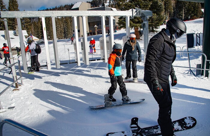 (Francisco Kjolseth  | The Salt Lake Tribune) People take to the slopes at Brighton Resort in Big Cottonwood Canyon on Tuesday, Jan. 5, 2020. Skiers were down during the holidays overall due to the low snow levels and the pandemic. Most out of staters kept their reservations, but some locals stayed away, waiting for better conditions.