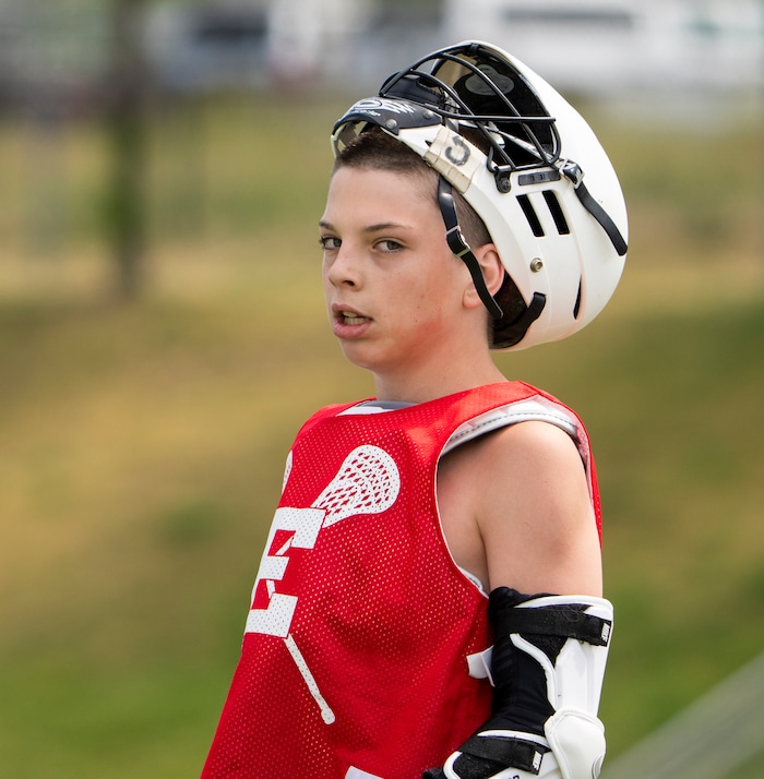 (Rick Egan | The Salt Lake Tribune)  Pete Killilea takes a break, in East youth lacrosse practice, on Wednesday, June 22, 2022.