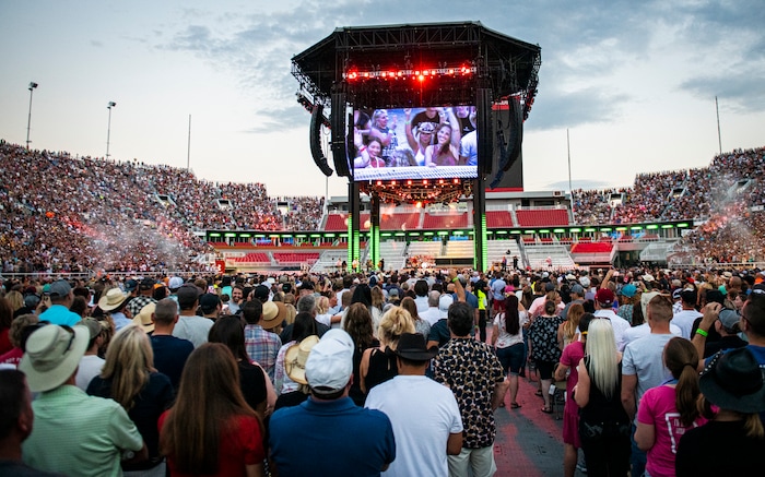 (Isaac Hale | Special to The Tribune) Fans watch as Garth Brooks performs with his band during a stop on their stadium tour held at Rice-Eccles Stadium in Salt Lake City on Saturday, July 17, 2021.