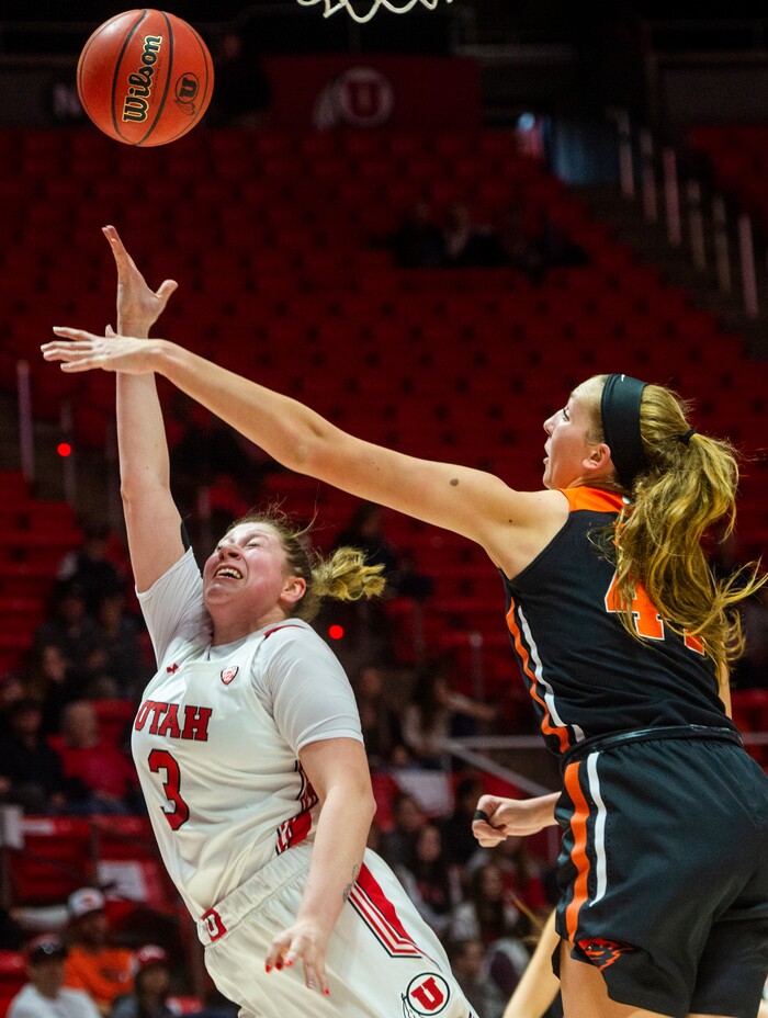 (Rick Egan  |  The Salt Lake Tribune)     Utah Utes forward Andrea Torres (3) takes the ball to the hoop, as Oregon State Beavers forward Taylor Jones (44) defends, in PAC-12 basketball action between the Utah Utes and the Oregon State Beavers at the Jon M. Huntsman Center, Saturday, Feb. 1, 2020.