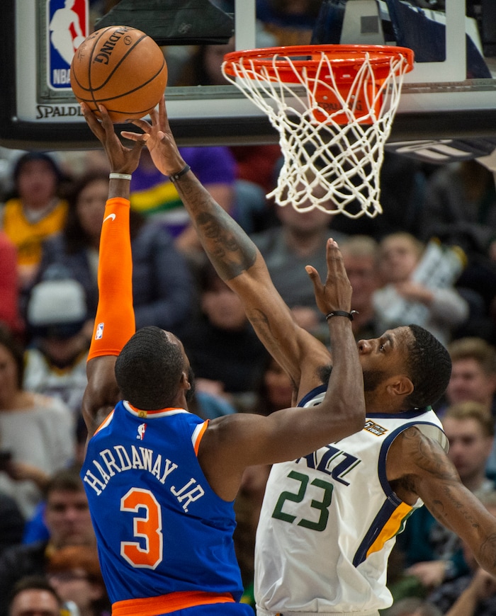 (Rick Egan  |  The Salt Lake Tribune)   Utah Jazz forward Royce O'Neale (23) blocks a shot by New York Knicks guard Tim Hardaway Jr. (3), in NBA action between Utah Jazz and New York Knicks, in Salt Lake City, Saturday, Dec. 29, 2018.