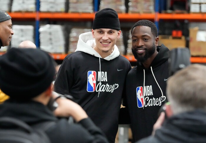 (Francisco Kjolseth | The Salt Lake Tribune) Tyler Herro of the Miami Heat and Jazz minority owner Dwyane Wade pose for a photo during the  NBA Cares Day of Service in Salt Lake City on Feb. 17, 2023.