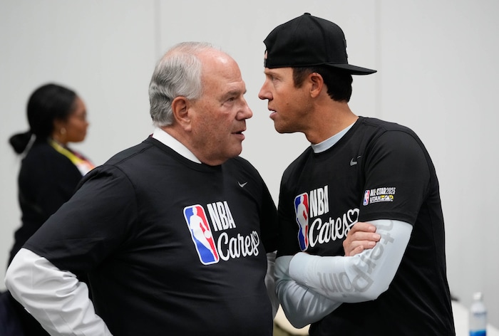 (Francisco Kjolseth | The Salt Lake Tribune) Apostle Ronald A. Rasband speaks with Utah Jazz owner Ryan Smith during the NBA Cares Day of Service in Salt Lake City on Feb. 17, 2023.