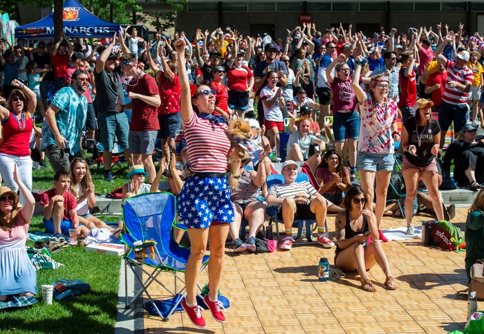 (Rick Egan  |  The Salt Lake Tribune)   Soccer fans celebrate as the US women's team scores a goal against the Netherlands in the World Cup final, during a watch party at the Gallivan Center in Salt Lake, Sunday, July 7, 2019.