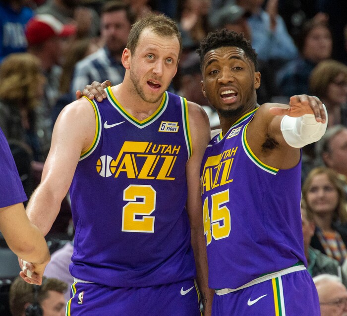 (Rick Egan  |  The Salt Lake Tribune)        Utah Jazz forward Joe Ingles (2) talks with Utah Jazz guard Donovan Mitchell (45) during a break in the action, in NBA action the Utah Jazz and the Washington Wizards, in Salt Lake City, Friday, March 29, 2019.