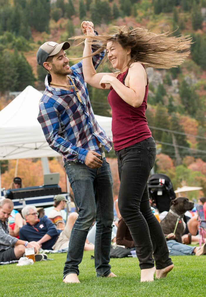 (Rick Egan  |  The Salt Lake Tribune)   Dylan Gregersen and Sheri Bigelow, from Salt Lake, dance to the music of the band Night Marcher, at the Blues, Brews & BBQ at Snowbasin resort  Sunday, Sept. 23, 2018.