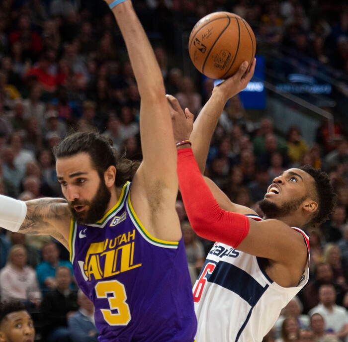 (Rick Egan  |  The Salt Lake Tribune)        Utah Jazz guard Ricky Rubio (3) picks up a  fouls as he collide with Washington Wizards forward Troy Brown Jr. (6), in NBA action between the Utah Jazz and the Washington Wizards, in Salt Lake City, Friday, March 29, 2019.