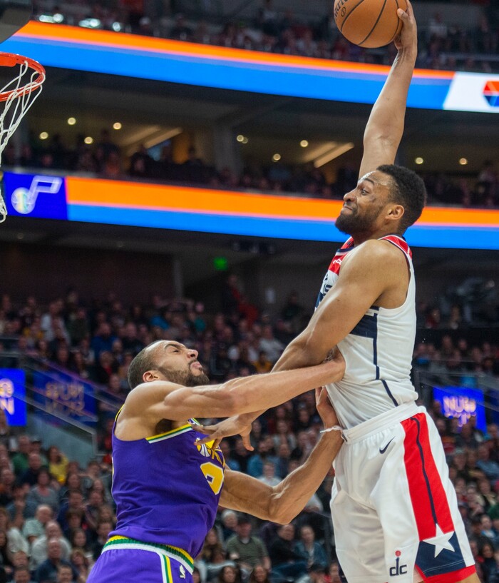 (Rick Egan  |  The Salt Lake Tribune)        Washington Wizards forward Jabari Parker (12) goes for a dunk overUtah Jazz center Rudy Gobert (27), in NBA action between the Utah Jazz and the Washington Wizards, in Salt Lake City, Friday, March 29, 2019.